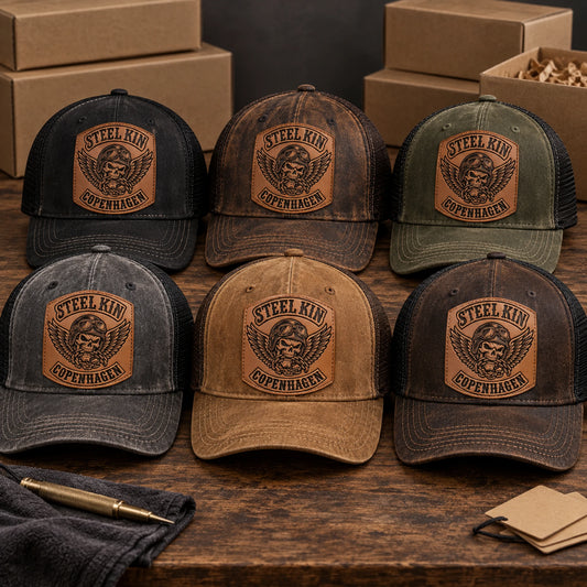 Finished motorcycle club leather patch hats prepared for inspection and delivery.