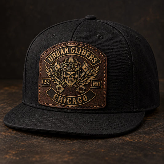 Foil-stamped motorcycle club leather patch hat with antique-brass accents.