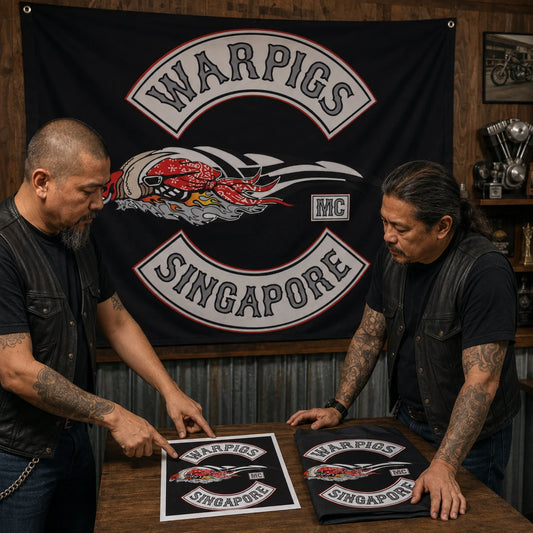 Motorcycle club members use a custom rectangular flag for custom club logo design in a realistic American V-twin setting.