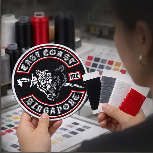 Custom club patches, rockers, pins and badges with an authorized motorcycle club logo shown during custom design review