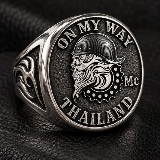 Heavy custom motorcycle club signet ring with a solid raised authorized club emblem.