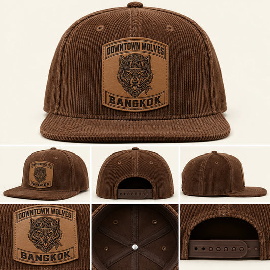 Vintage-washed black motorcycle club snapback hat with leather patch and solid fabric rear panels.