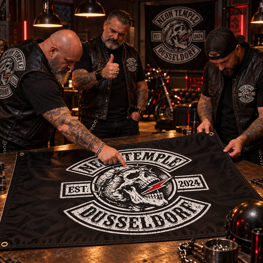 Club officers approving artwork, color and finishing on a custom flag proof for a motorcycle club.