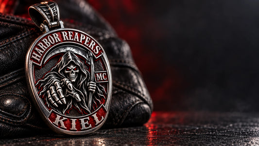 Premium Harbor Reapers motorcycle club zinc alloy pendant concept beside dark leather riding gear.