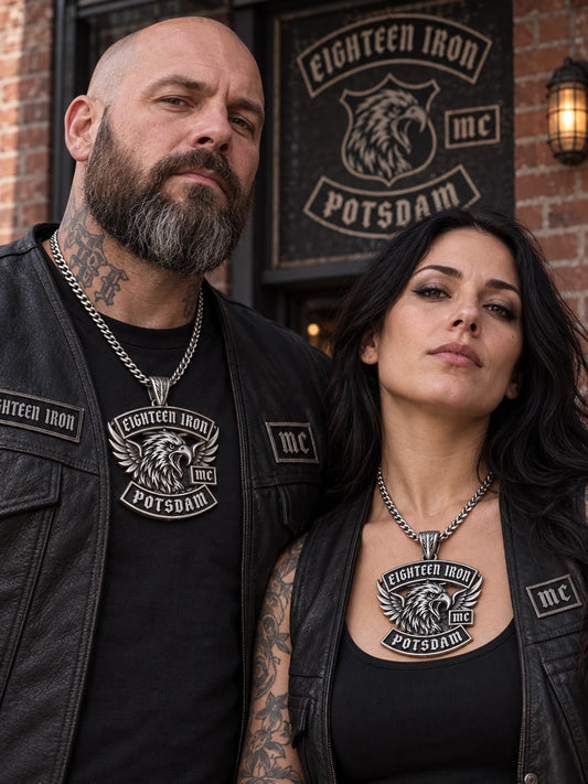 Mature motorcycle club members wearing matching Eighteen Iron custom stainless steel pendants at a clubhouse.