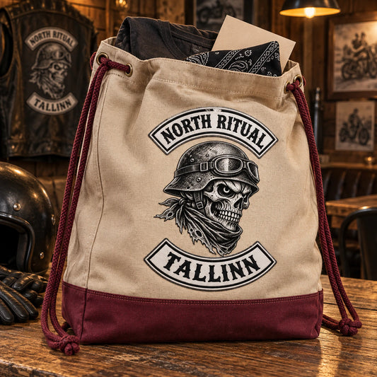 A motorcycle club membership officer presents a custom drawstring welcome pack to a new supporter.