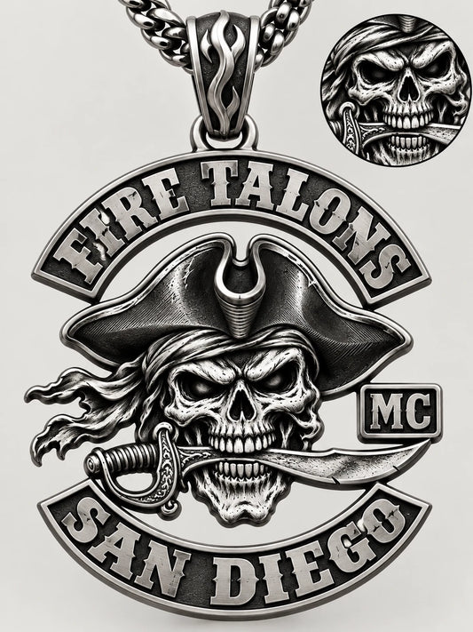 Close details of a Fire Talons custom stainless steel motorcycle club pendant showing relief, thickness and bail.
