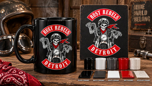 Wide product-only design consultation table: complete black mug with club emblem, full printed logo proof, ceramic color chips and material samples all fully visible within frame.