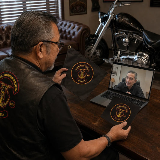 Motorcycle club production artwork being reviewed during free design support.