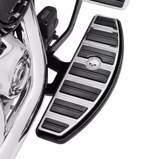 Skull rider footboard pad installed on a Harley Softail motorcycle