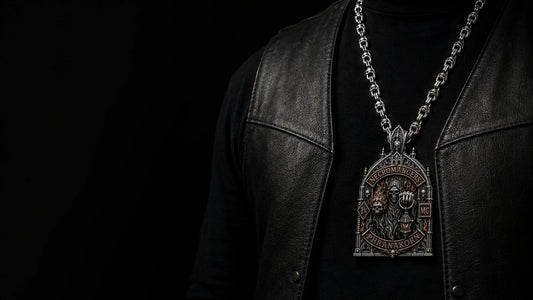 Custom motorcycle club pendant worn on a member’s black leather vest, with the complete necklace and pendant clearly visible.