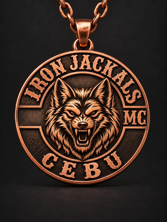 Iron Jackals round commemorative motorcycle club pendant in pure copper with a short chain.