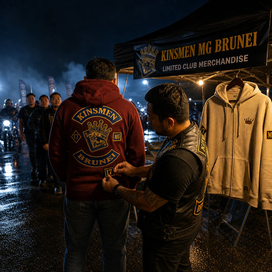 A member receives a limited-edition motorcycle club hoodie in a square nighttime rally merchandise scene.