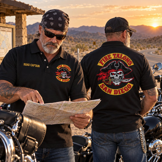 Fire Talons San Diego road captain and club member review a route in custom polos showing role embroidery and a large back logo.