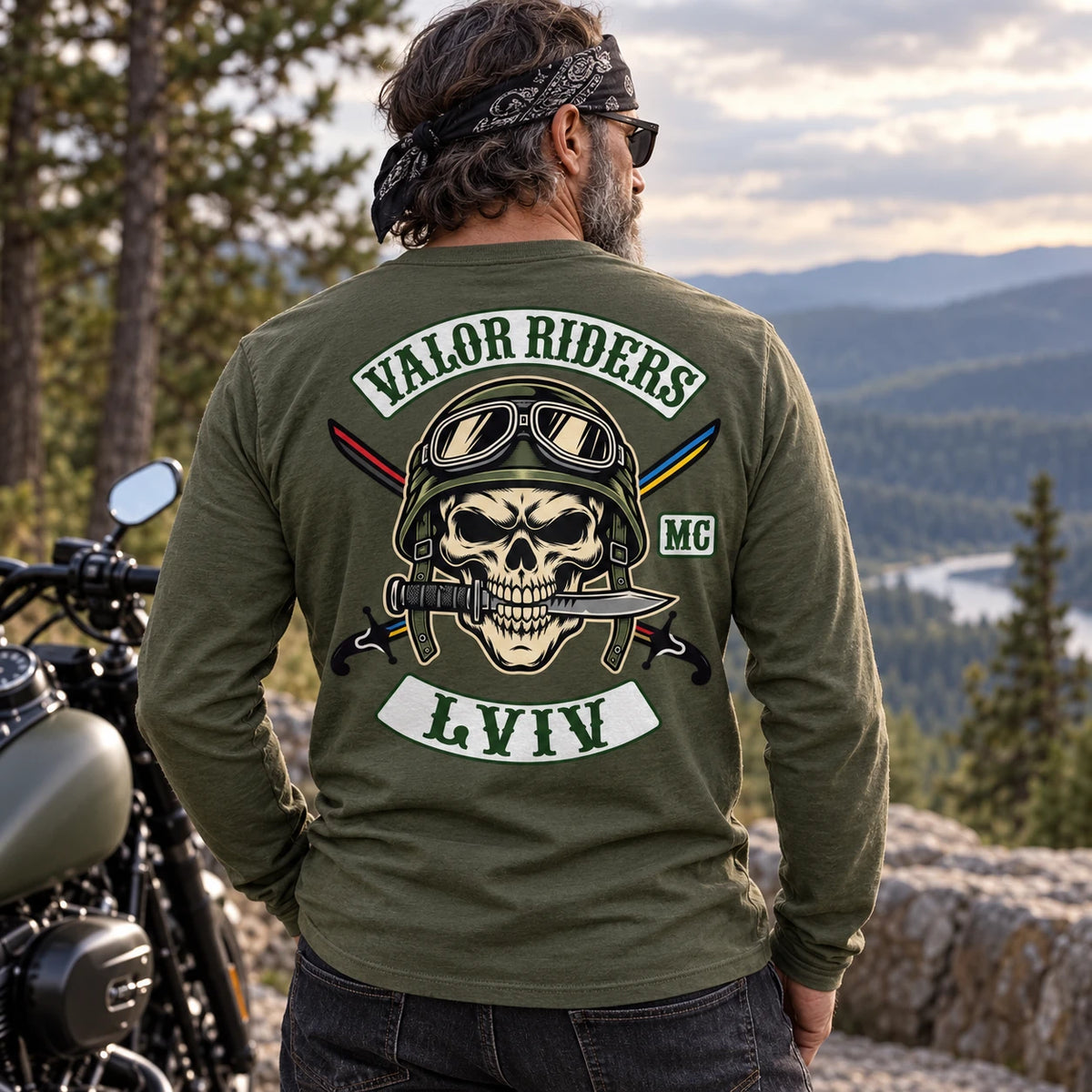 Military green motorcycle club long-sleeve shirt at a forest road turnout.