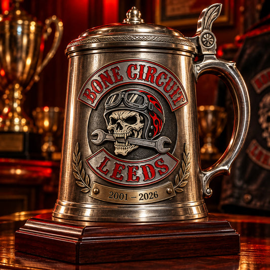 Commemorative metal mug on trophy shelf displaying an authorized logo for a custom motorcycle club metal mug project.