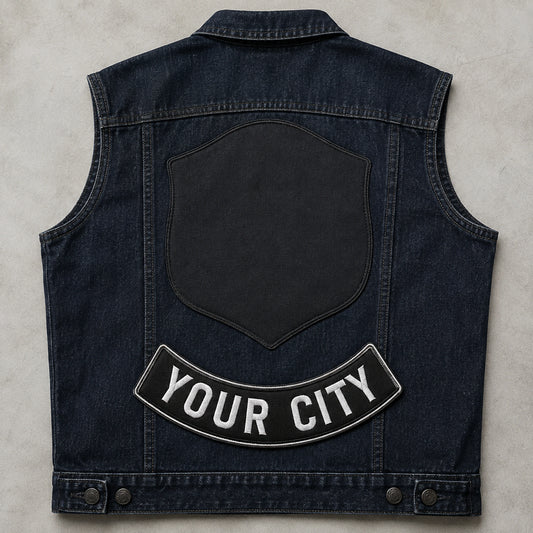 Custom motorcycle club bottom rocker only placed below a neutral blank center-patch area on a vest.