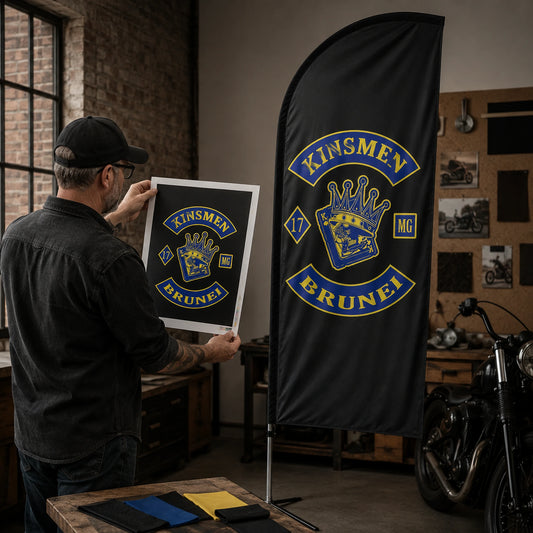 Free Design Support: custom motorcycle club feather flag shown in designer scaling the authorized emblem on a printed full-height layout.