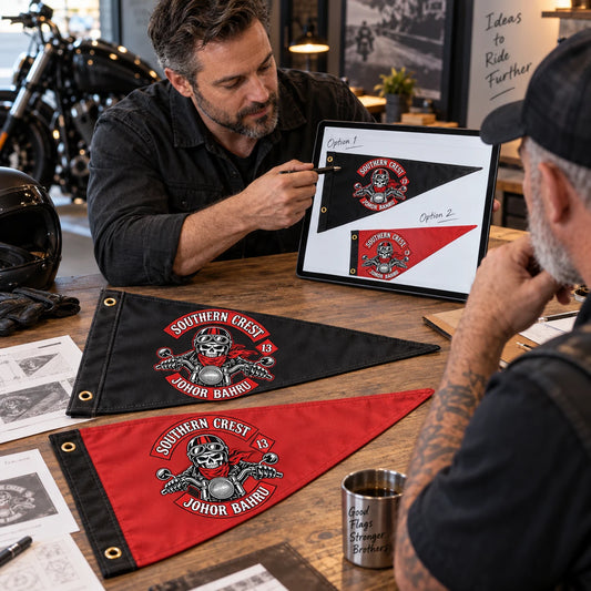 A senior designer presents a tailored triangle flag concept based on the motorcycle club's approved logo.
