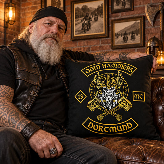 Veteran club founder displays a custom cushion featuring approved heritage artwork.