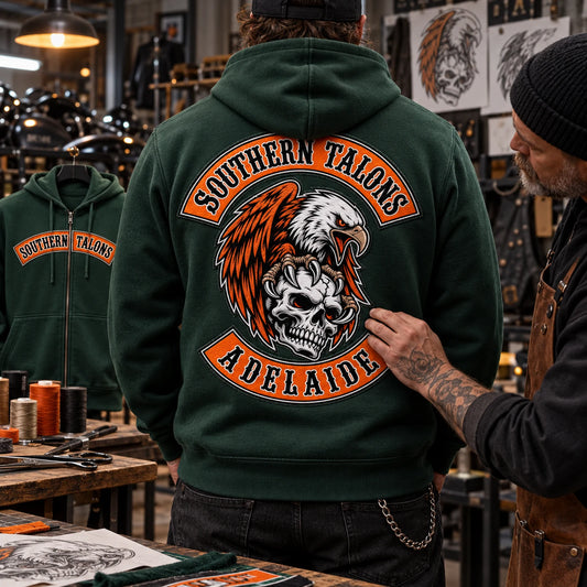 Combined decoration techniques featuring a custom motorcycle club hoodie with authorized club artwork.