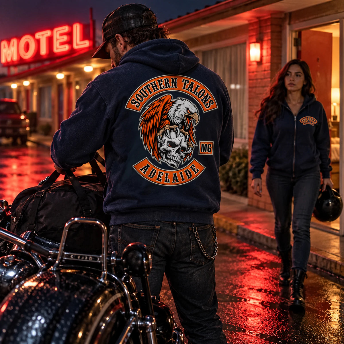 Dark blue zip hoodie at a roadside motel featuring a custom motorcycle club hoodie with authorized club artwork.