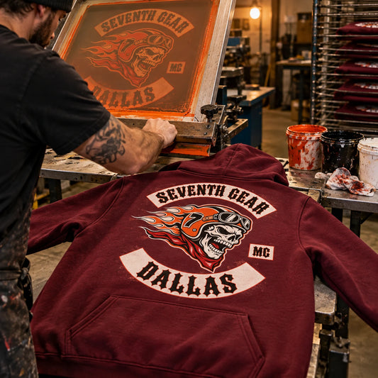 Screen printing on the back of a hoodie featuring a custom motorcycle club hoodie with authorized club artwork.