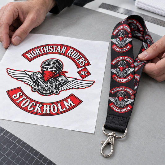 A full-color transfer proof beside a matching dye-sublimated motorcycle club lanyard.