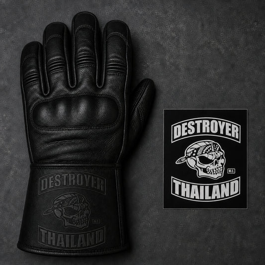 A black gauntlet glove displays the complete supplied club emblem in tone-on-tone pressed leather.