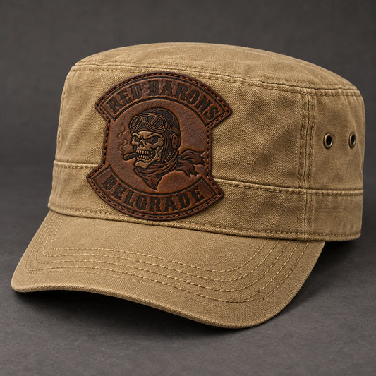 Tan canvas military cadet cap with a debossed leather club patch.