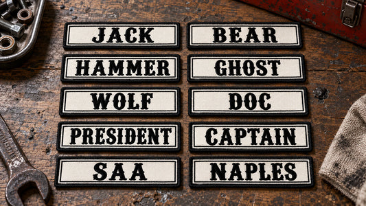 A complete chapter order of many name bars arranged in organized rows, one approved style with different member road names and officer titles, showing custom motorcycle club name bar patch options.