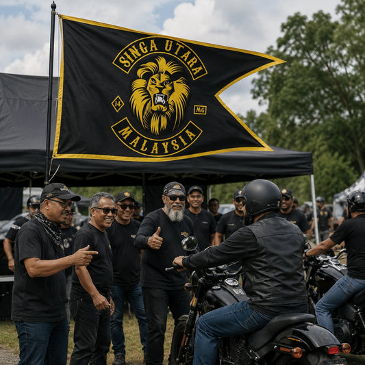 Custom motorcycle club swallowtail flag identifying a club canopy at a busy daytime rally.