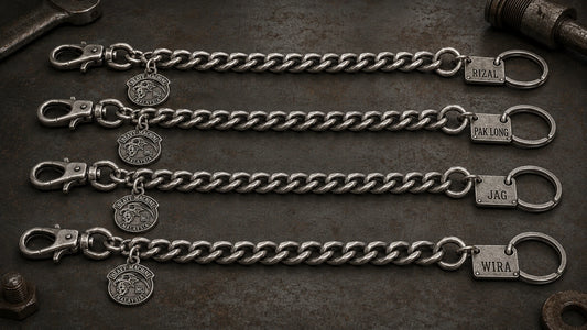 Four open personalized motorcycle club pants chains with lobster clasps, wallet rings, engraved member tags and metal club medallions.