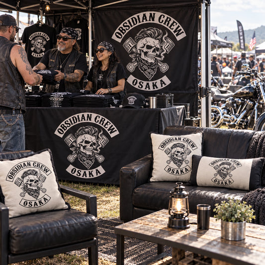 Matching motorcycle club cushions furnish a branded rally booth hospitality area.