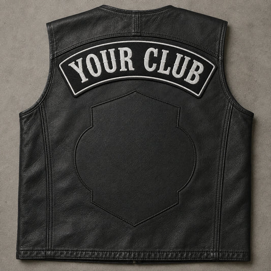 Custom motorcycle club top rocker only placed above a neutral blank center-patch area on a vest.