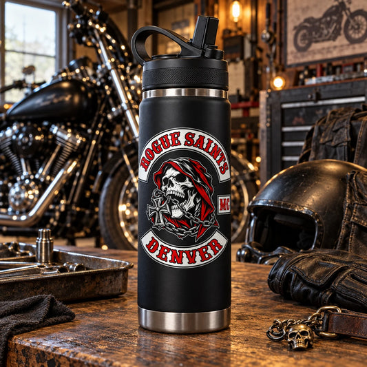 Vacuum-insulated motorcycle club tumbler in a workshop setting.