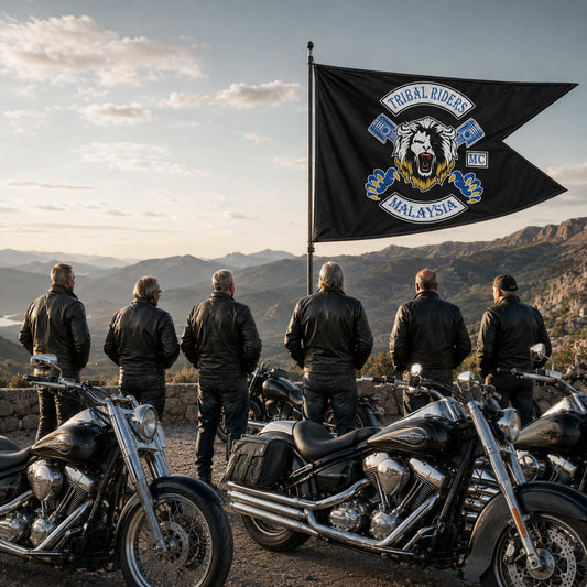 V-twin touring riders gathered with their custom motorcycle club swallowtail flag at a mountain overlook.