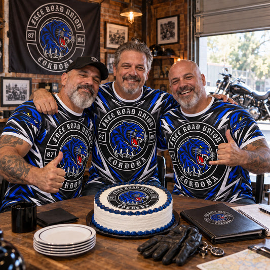 Free Road Union Cordoba motorcycle club members wearing full-coverage performance shirts at a clubhouse celebration.