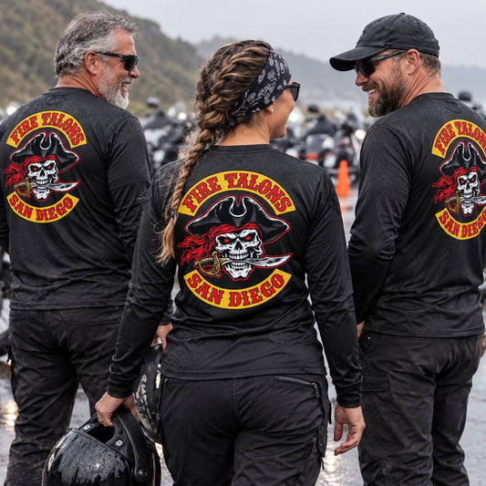 Motorcycle club rally crew wearing lightweight performance long-sleeve shirts at a checkpoint.