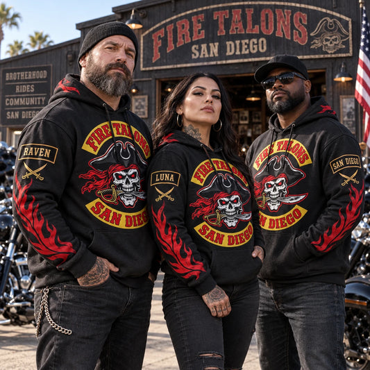 Three club members wearing coordinated custom hoodies with different approved road names and chapter details.