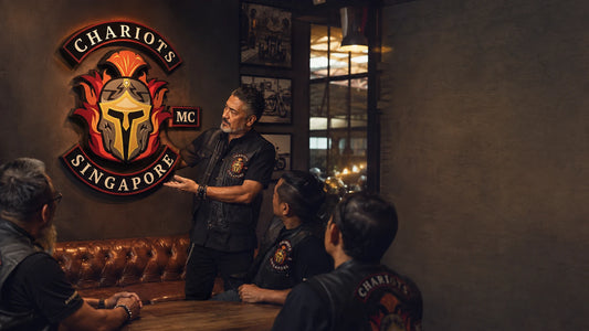 Personalized motorcycle club tin sign featuring custom chapter artwork for biker clubhouse display.