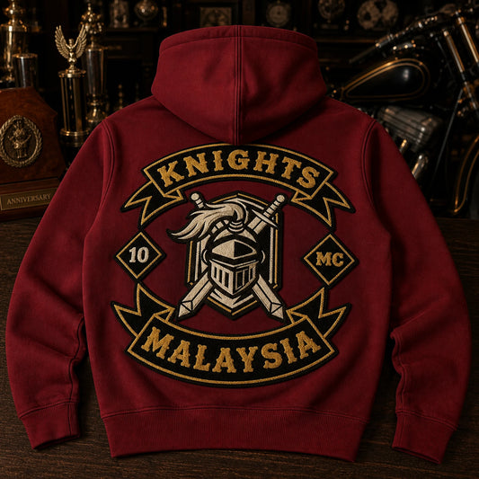 The back of a red motorcycle club hoodie displays raised black, gold and cream chenille anniversary embroidery.
