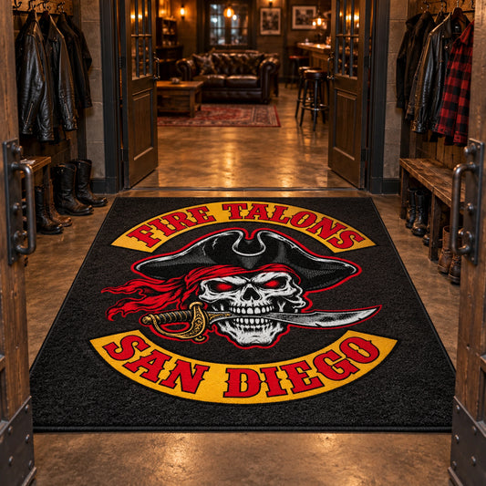 Motorcycle club members step across a custom clubhouse entrance rug.