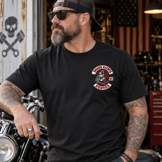 Small Rogue Saints emblem printed on the left chest of a black motorcycle club T-shirt.