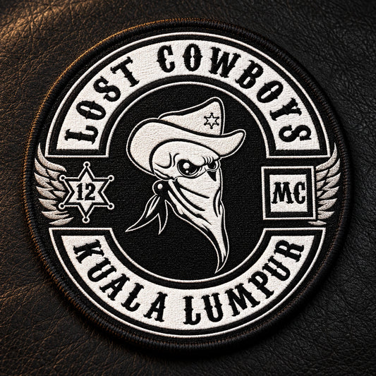 Round embroidered motorcycle memorial patch with an authorized club emblem on black leather.