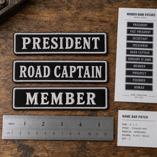 Name-bar samples, a clean measurement card and an organized member-name proof sheet at an artwork intake desk, with patches as the dominant subject, showing custom motorcycle club name bar patch options.