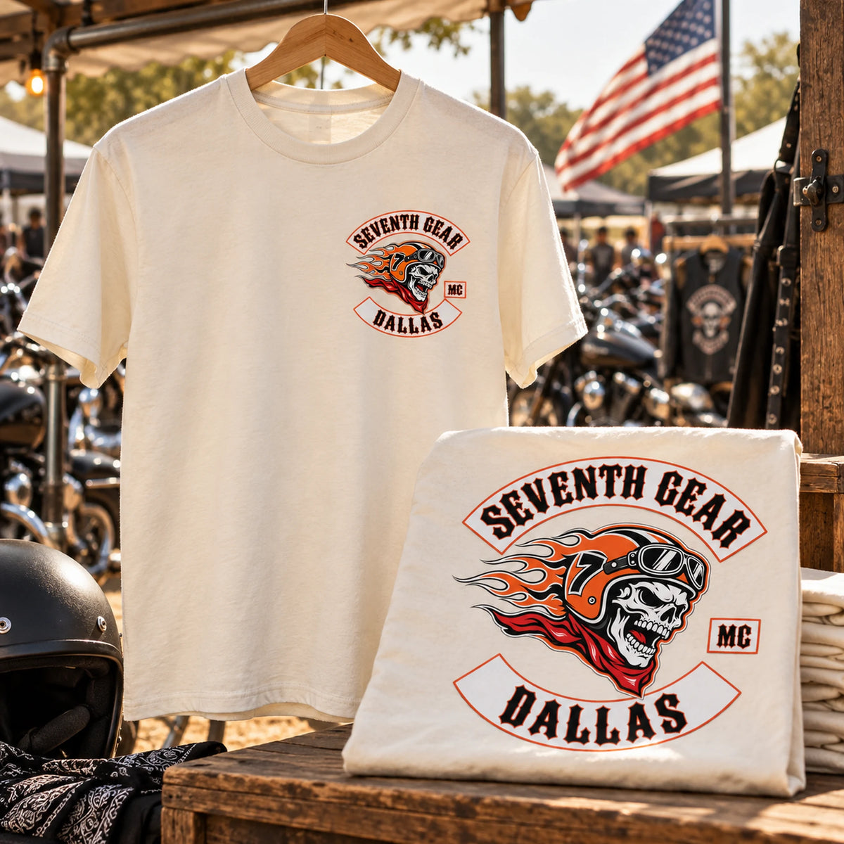 Seventh Gear cream custom club T-shirts displayed at a motorcycle rally merchandise booth.