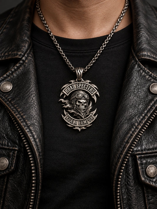 Compact represented by a unique custom motorcycle-club pendant with complete chain and sculptural mixed-metal architecture.