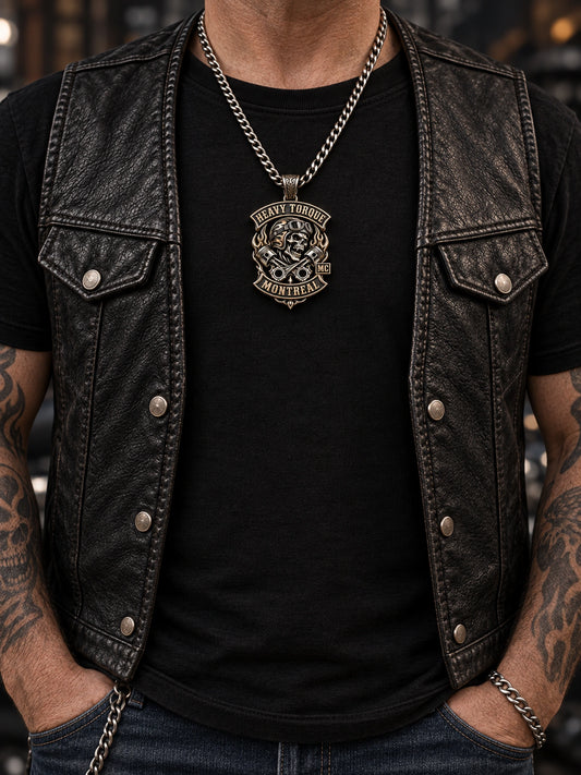 A unified Heavy Torque Montreal motorcycle club pendant worn at a realistic 40–50 mm size with a complete chain.