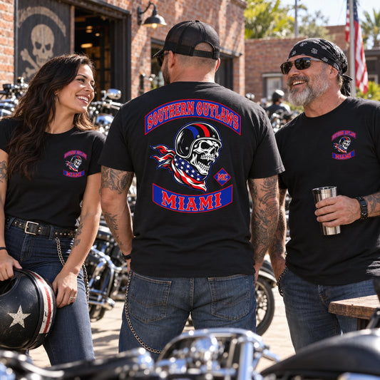 Southern Outlaws chapter members wearing coordinated custom short-sleeve T-shirts outside a brick clubhouse.